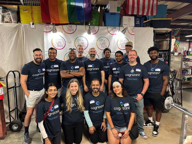 <p>Cognizant</p> Team members representing Collaborative Solutions, a Cognizant Company, volunteer at the Lost-n-Found Youth Thrift Store in Atlanta during Pride 2024.