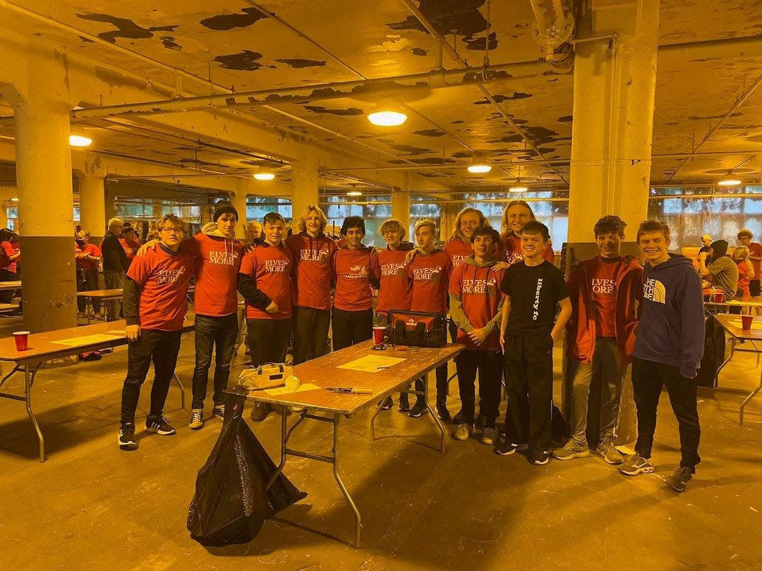 The Stow-Munroe Falls High School boys soccer team joined other organizations along with Elves and More of Northeast Ohio to help build bikes for area neighborhood children.