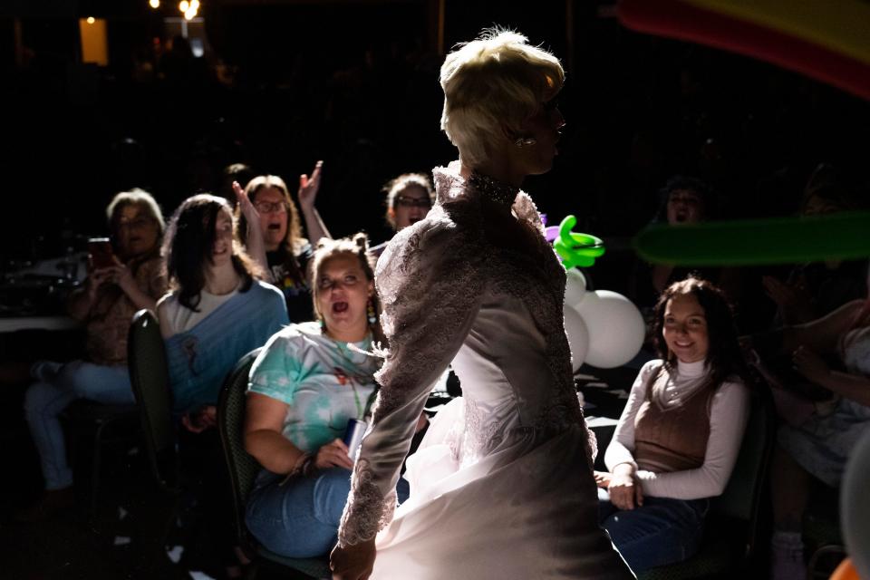 Attendees cheer and smile as drag queen Miami Rose performs during Jackson Pride Fest in the Carl Perkins Civic Center on Saturday, October 8, 2022, in Jackson, Tenn.