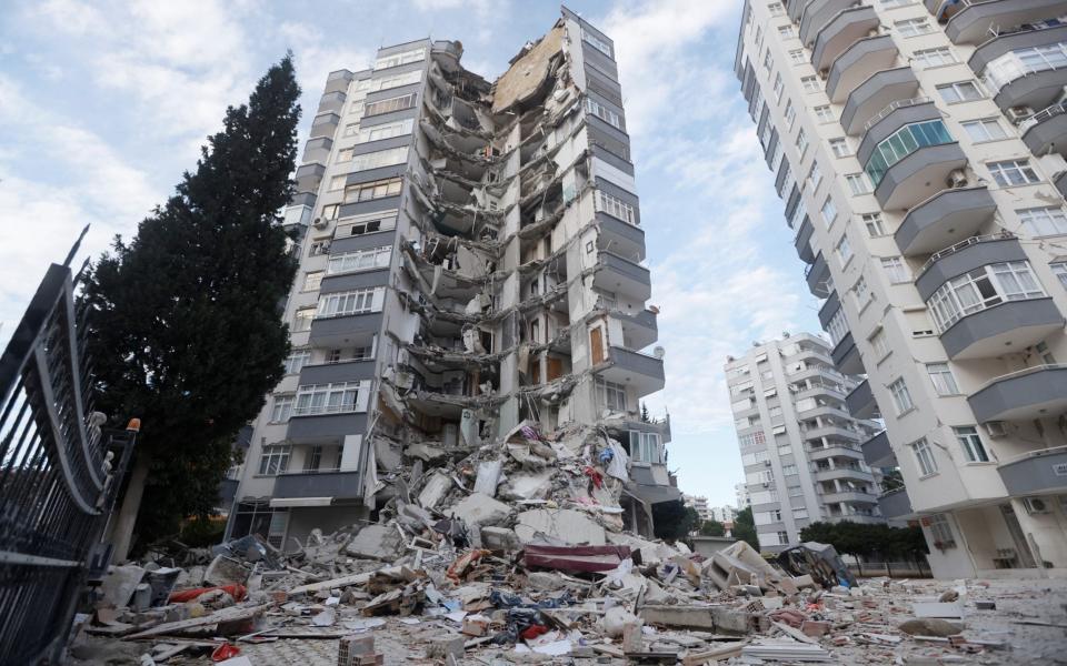A semi-collapsed building following the earthquake in Adana, Turkey - EMILIE MADI/REUTERS
