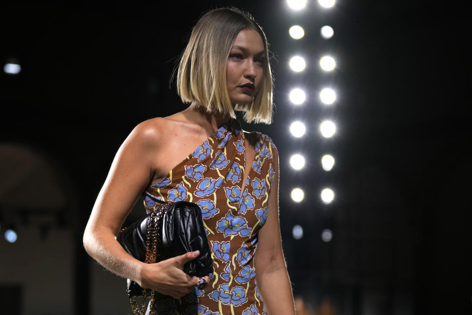 A model wears a creation as part of the Versace Spring Summer 2025 collection, that was presented in Milan, Italy, Friday, Sept. 20, 2024. (AP Photo/Antonio Calanni)