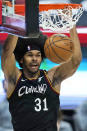 Cleveland Cavaliers' Jarrett Allen dunks against the Chicago Bulls during the second half of an NBA basketball game, Wednesday, April 21, 2021, in Cleveland. (AP Photo/Tony Dejak)