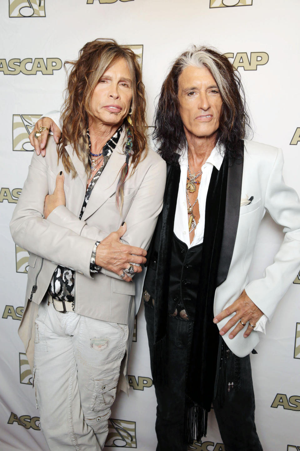 FILE - In this April 8, 2013 photo, Steven Tyler, left, and Joe Perry, recipients of the ASCAP Founders Award, pose at the ASCAP Press Conference held at the Sunset Marquis, in Los Angeles. Tyler and Perry will be honored with the award during ASCAP's 30th annual Pop Music Awards at a gala on April 17, 2013, in Los Angeles. (Photo by Eric Charbonneau/Invision/AP, File)