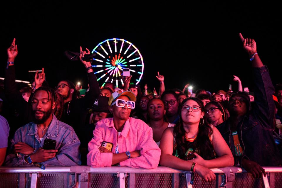Spectators watch Jeezy and DJ Drama perform at the Dreamville Festival on Sunday, April 3, 2022, in Raleigh.