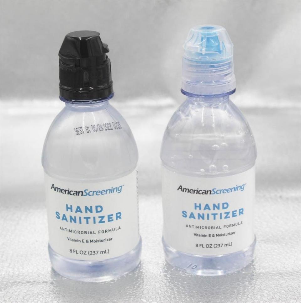 Bottles of American Screening hand sanitizer.  The company announced a voluntary recall of bottles similar to these due to their similarity to water bottles.