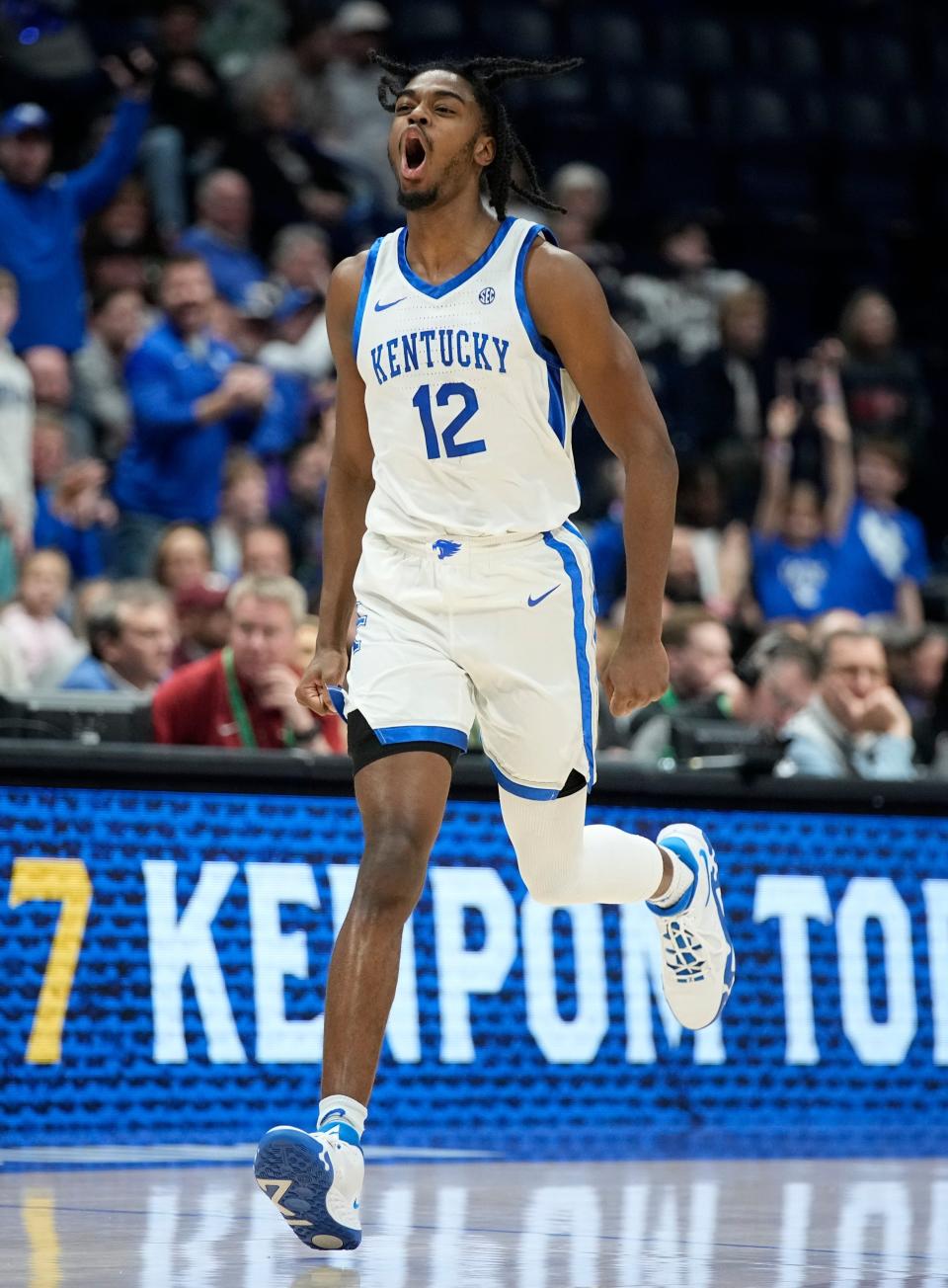 Kentucky guard Antonio Reeves (12) celebrates a three point basket against Vanderbilt during the first half of a quarterfinal SEC Menâ€™s Basketball Tournament game at Bridgestone Arena Friday, March 10, 2023, in Nashville, Tenn.

Sec Basketball Vanderbilt Vs Kentucky