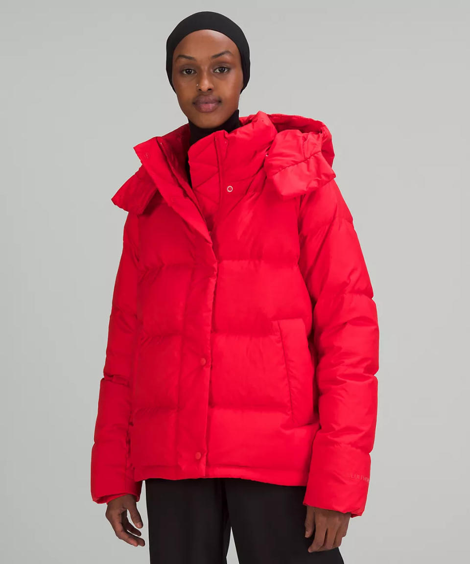 model wears red Wunder Puff Jacket (Photo via Lululemon)