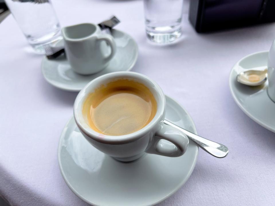 Cup of espresso on table