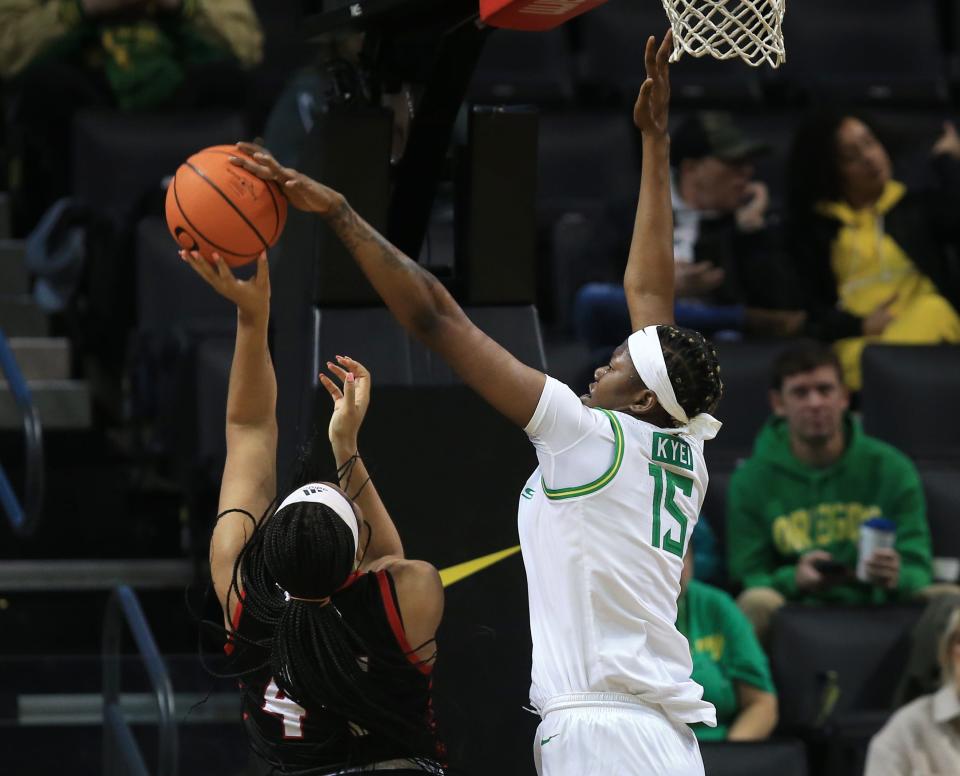 Oregon's Phillipina Kyei, right, blocks a shot by Seattle Mya Moore during the second half at Matthew Knight Arena.