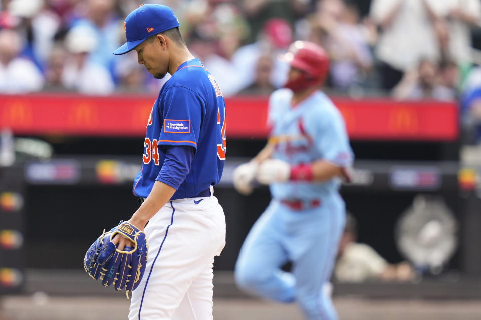 New York Mets starting pitcher Kodai Senga, left, of Japan, reacts as St. Louis Cardinals' Paul Goldschmidt runs the bases after hitting a two-run home run during the second inning of a baseball game Saturday, June 17, 2023, in New York. (AP Photo/Frank Franklin II)