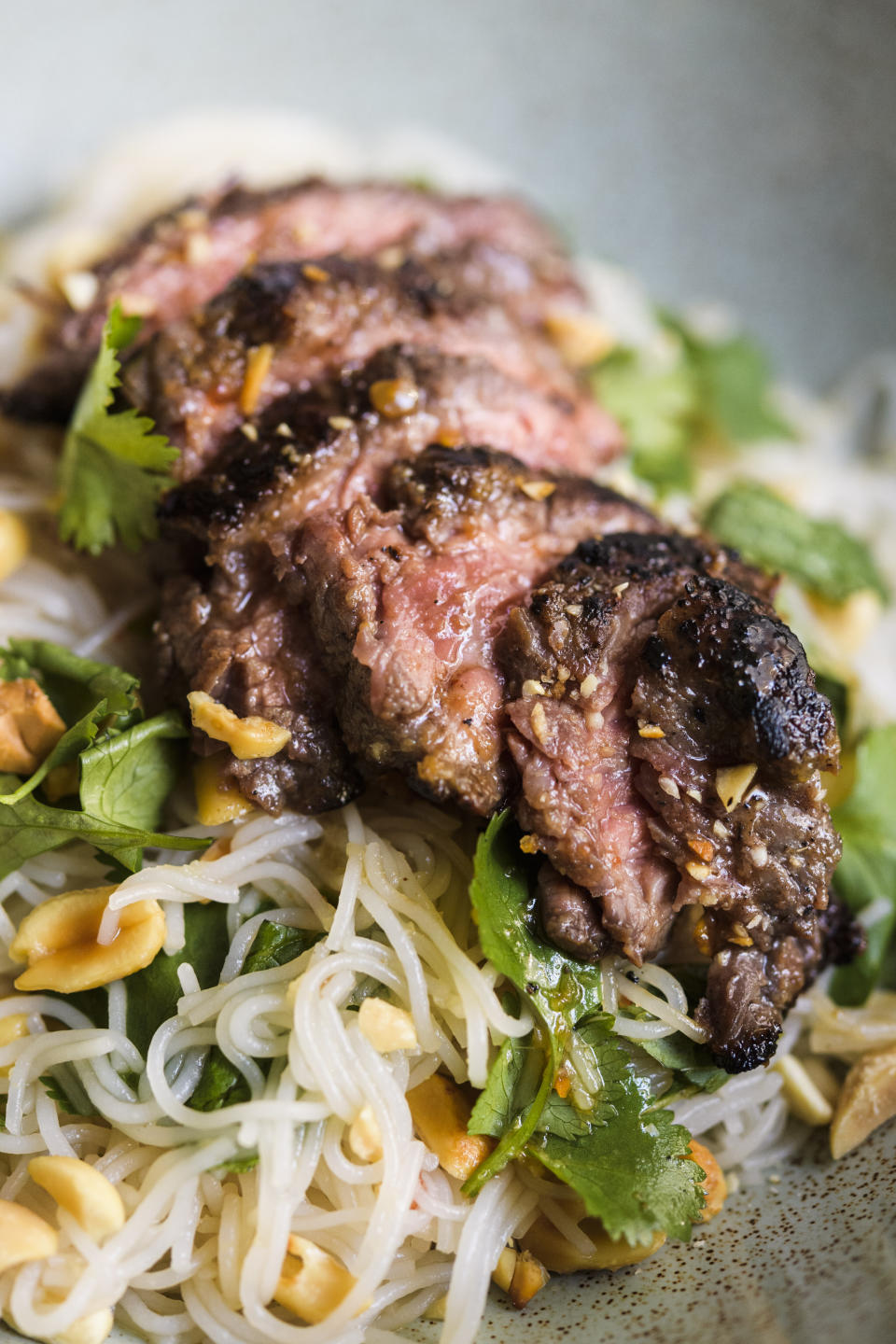 This image released by Milk Street shows a recipe for ginger beef and rice noodle salad. (Milk Street via AP)