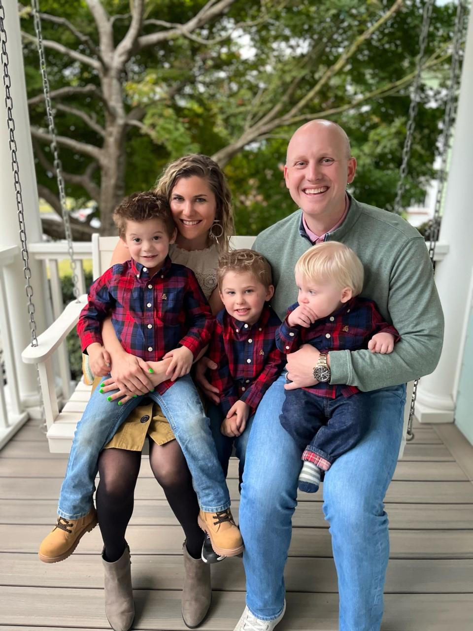 Laura Holt poses with her husband and three children. Holt was diagnosed with multiple sclerosis 10 years ago following an athletic journey as a UNCW soccer player.