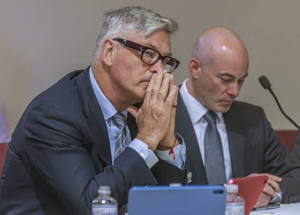 Actor Alec Baldwin, left, sits with his lawyer Luke Nikas, in District Court in Santa Fe, N.M., Monday, July 8, 2024, during a preliminary hearing in his involuntary manslaughter trial over a fatal shooting on the set of the film, "Rust." (Luis Sánchez Saturno/Santa Fe New Mexican via AP)