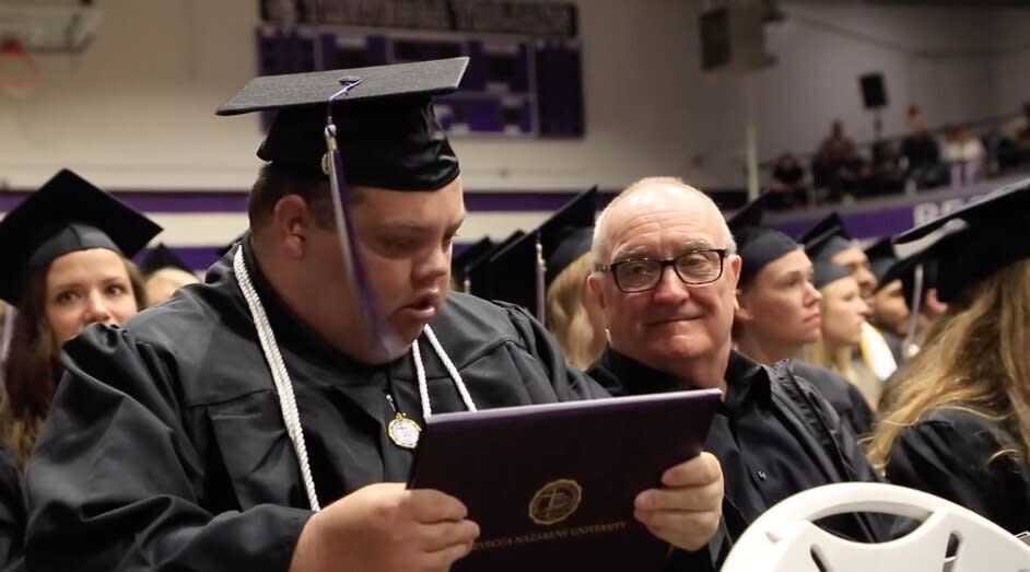 Brian Schnelle sits with his father Jeff at the Trevecca Nazarene University. (Credit: Trevecca Nazarene University)