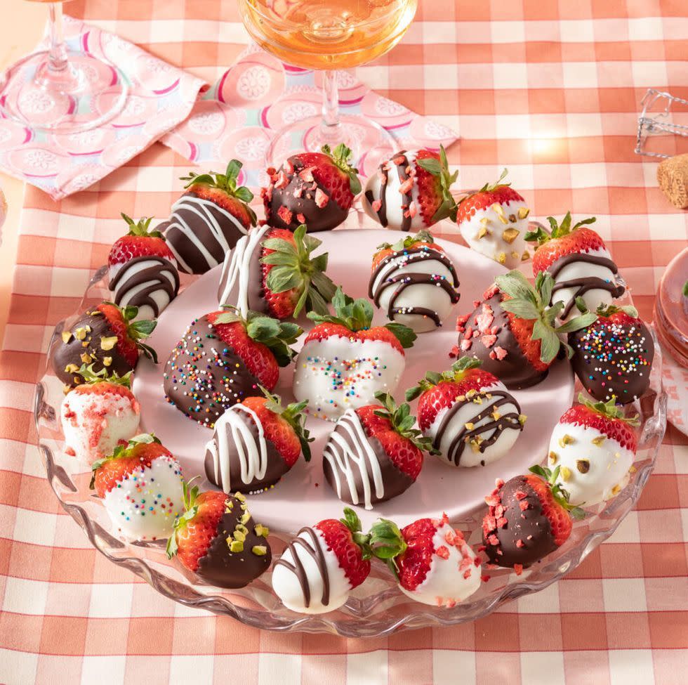 chocolate covered strawberries on round plate