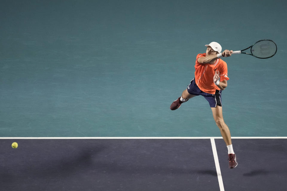 Australia's Alex de Minaur follows through on a return to Stefanos Tsitsipas, of Greece, during a Mexican Open tennis tournament match in Acapulco, Mexico, Thursday, Feb. 29, 2024. (AP Photo/Eduardo Verdugo)