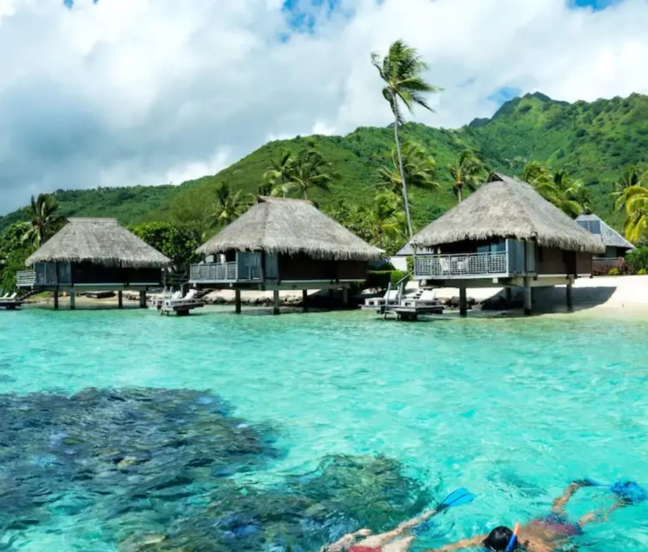 <p>“I always dreamed of staying in an overwater room, so on our honeymoon, my husband and I got a panoramic bungalow at the <a href="https://www.hilton.com/en/hotels/pptmlhh-hilton-moorea-lagoon-resort-and-spa/" rel="nofollow noopener" target="_blank" data-ylk="slk:Hilton Moorea;elm:context_link;itc:0;sec:content-canvas" class="link ">Hilton Moorea</a>,” says <a href="http://moon.com/" rel="nofollow noopener" target="_blank" data-ylk="slk:Moon Guides;elm:context_link;itc:0;sec:content-canvas" class="link ">Moon Guides</a> and <a href="http://www.fodors.com/" rel="nofollow noopener" target="_blank" data-ylk="slk:Fodor’s;elm:context_link;itc:0;sec:content-canvas" class="link ">Fodor’s</a> author Margot Bigg. “My favorite part was being able to swim and kayak straight from our deck out into the lagoon. My husband loved watching the fish—and even small sharks—swimming below us through a glass floor section below our coffee table.”</p><p>According to Wade, the idyllic Tahitian island of Moorea—an easy hop from Tahiti's capital, Papeete—offers the best value for the honeymoon crowd in the South Pacific. The Hilton is the top resort choice, he adds, commending the spectacular resort's large overwater bungalows and unbeatable island views.</p><p>[From $1,049 per night; <a href="https://clicks.trx-hub.com/xid/arena_0b263_mensjournal?q=https%3A%2F%2Fgo.skimresources.com%3Fid%3D106246X1712071%26xs%3D1%26xcust%3Dmj_owbungalows_jrane-1023%26url%3Dhttps%3A%2F%2Fwww.hilton.com%2Fen%2Fhotels%2Fpptmlhh-hilton-moorea-lagoon-resort-and-spa%2F&event_type=click&p=https%3A%2F%2Fwww.mensjournal.com%2Ftravel%2Fover-water-bungalows%3Fpartner%3Dyahoo&author=Perri%20Ormont%20Blumberg&item_id=ci02b8d1af70042605&page_type=Article%20Page&partner=yahoo&section=travel%20guide&site_id=cs02b334a3f0002583" rel="nofollow noopener" target="_blank" data-ylk="slk:hilton.com;elm:context_link;itc:0;sec:content-canvas" class="link ">hilton.com</a>]</p>