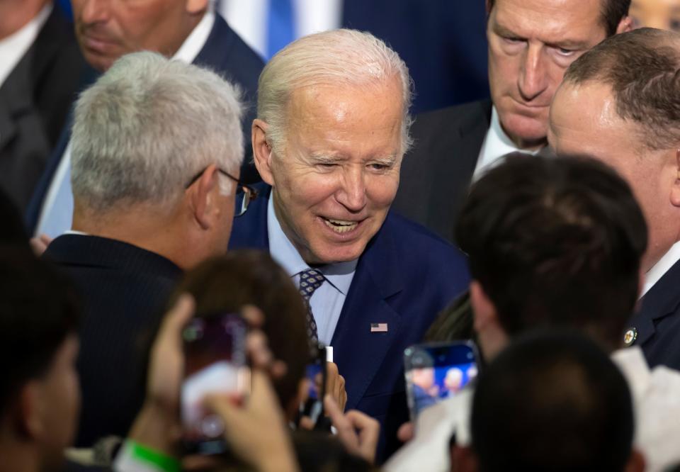 President Joe Biden speaks with a supporter at the end of a campaign rally in Albuquerque, N.M., Thursday, Nov. 3, 2022. Biden campaigned on Thursday in Albuquerque with New Mexico Gov. Michelle Lujan Grisham before heading to southern California to stump for San Diego-area Rep. Mike Levin.