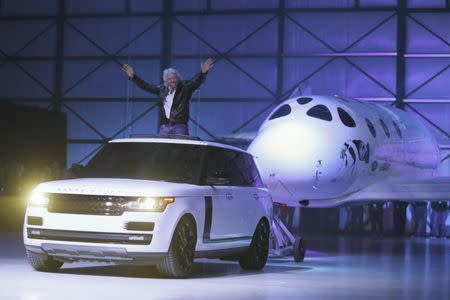 Richard Branson unveils the new SpaceShipTwo, a six-passenger two-pilot vehicle meant to ferry people into space that replaces a rocket destroyed during a test flight in October 2014, in Mojave, California, United States, February 19, 2016. REUTERS/Lucy Nicholson/Files
