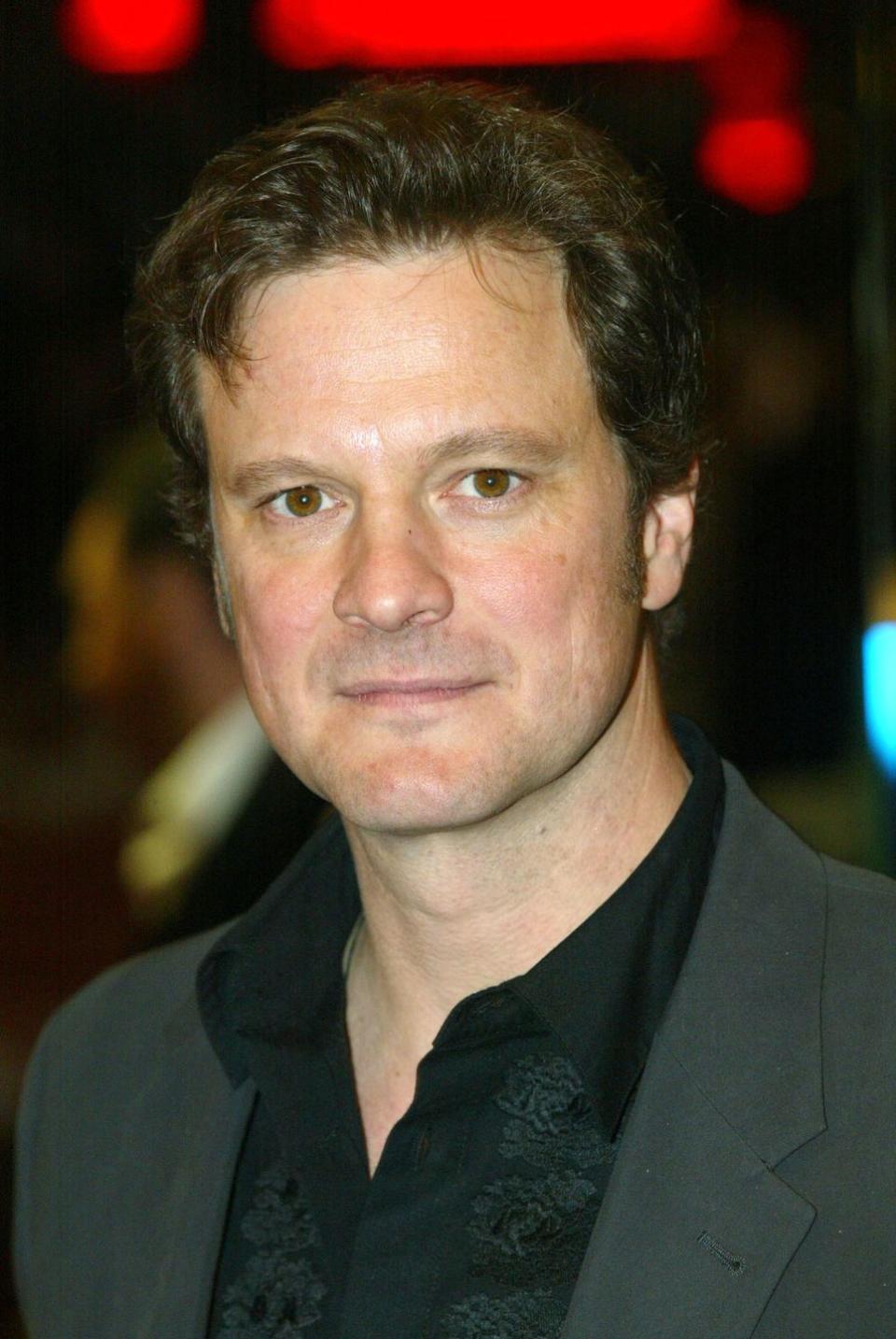 <p>From <em>Pride & Prejudice </em>to <em>Bridget Jones's Diary</em>, Colin Firth's curly brown hair is part of his signature look.</p>