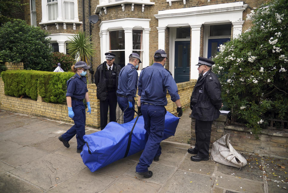 Police erect a tent outside a house in north London, thought to be in relation to the death of Conservative MP Sir David Amess, Sunday, Oct. 17, 2021. Leaders from across Britain's political spectrum have come together to pay tribute to a long-serving British lawmaker who was stabbed to death in what police have described as a terrorist attack. (Dominic Lipinski/PA via AP)