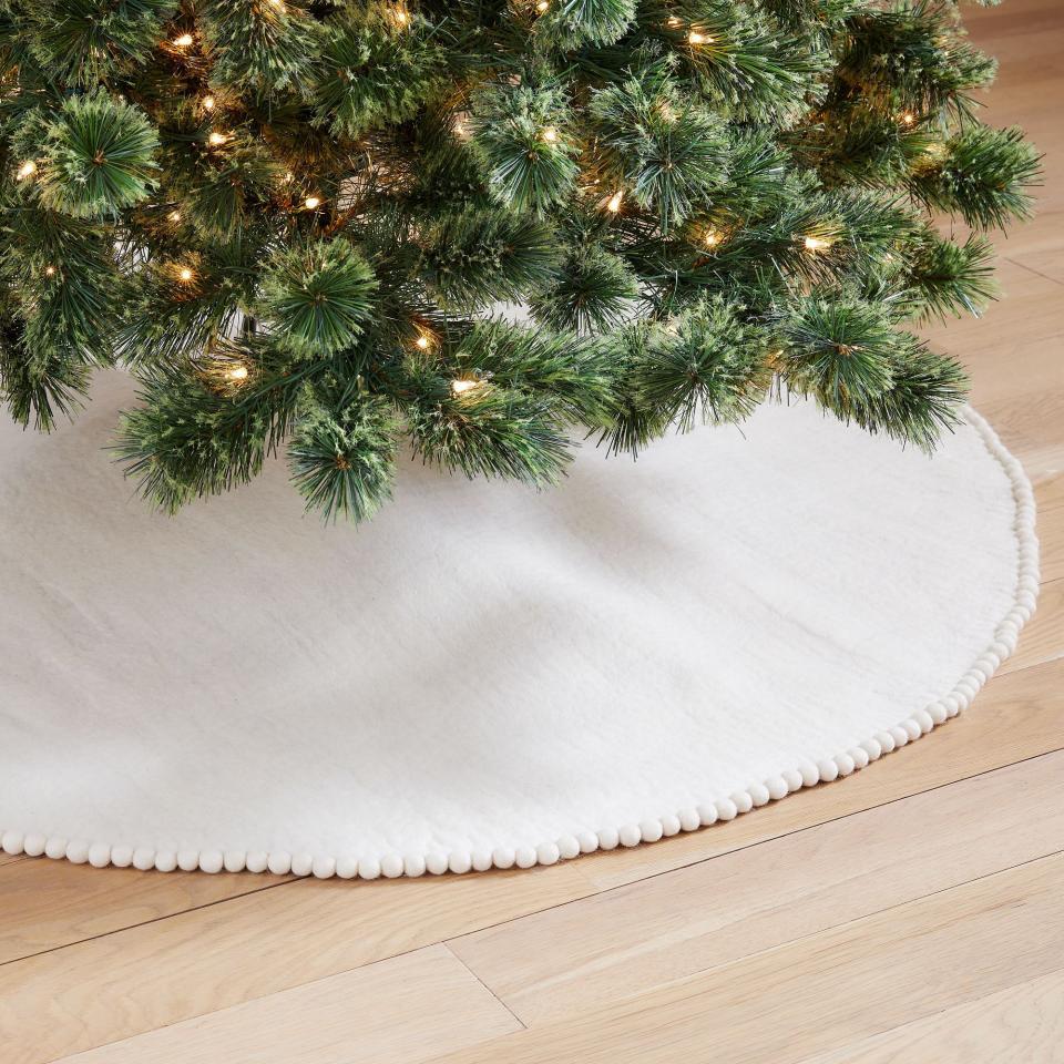 <p><a href="https://go.redirectingat.com?id=74968X1596630&url=https%3A%2F%2Fwww.westelm.com%2Fproducts%2Ffelt-pom-pom-tree-skirt-d5537%2F&sref=https%3A%2F%2Fwww.womansday.com%2Fhome%2Fdecorating%2Fg45446477%2Fbest-christmas-tree-skirts%2F" rel="nofollow noopener" target="_blank" data-ylk="slk:Shop Now;elm:context_link;itc:0;sec:content-canvas" class="link ">Shop Now</a></p><p>Felt Pom Pom Tree Skirt</p><p>West Elm</p><p>$79.00</p><span class="copyright">West Elm</span>