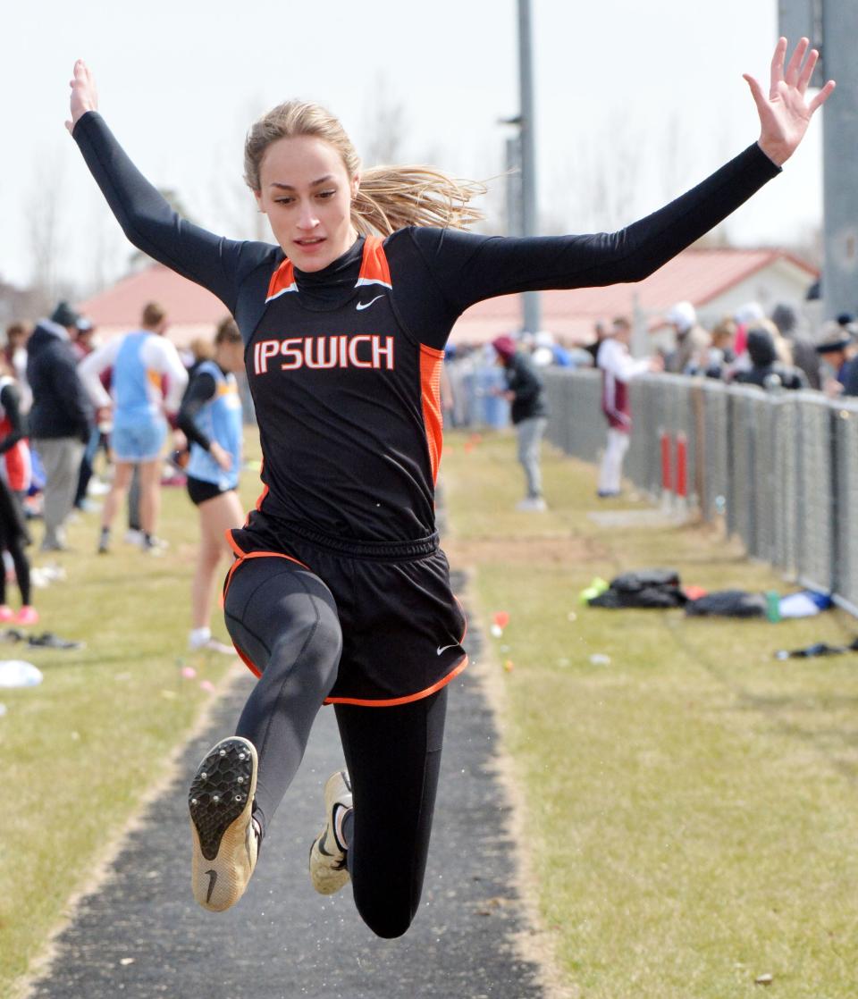 Gracie Lange of Ipswich is pictured in the girls' long jump during the Pat Gilligan Alumni track and field meet on Tuesday, April 25, 2023 in Estelline.