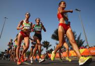 <p>What, you didn't know race walking was an Olympic sport? What sets it apart from running is the fact that the athlete must <a href="https://www.usatf.org/disciplines/race-walking" rel="nofollow noopener" target="_blank" data-ylk="slk:always maintain contact;elm:context_link;itc:0;sec:content-canvas" class="link ">always maintain contact</a> with the ground. Olympic judges note the technique of an athlete to determine fouls and disqualification. </p>