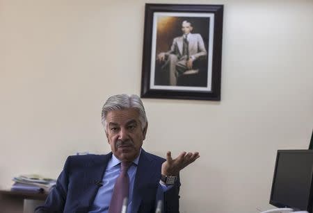 Pakistan's Defence Minister Khawaja Asif speaks during an interview with Reuters at his office in Islamabad March 6, 2014. REUTERS/Faisal Mahmood