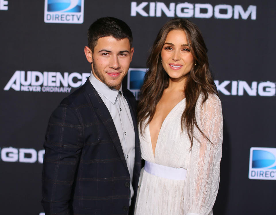 VENICE, CA - OCTOBER 01:  Singer/actor Nick Jonas (L) and Olivia Culpo attend the Premiere Event for DIRECTV's KINGDOM on October 1, 2014 in Venice, California.  (Photo by Mark Davis/Getty Images)