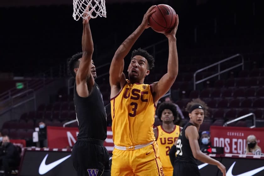 Southern California forward Isaiah Mobley (3) shoots against Washington during the second half of an NCAA college basketball game Thursday, Jan. 14, 2021, in Los Angeles. (AP Photo/Marcio Jose Sanchez)