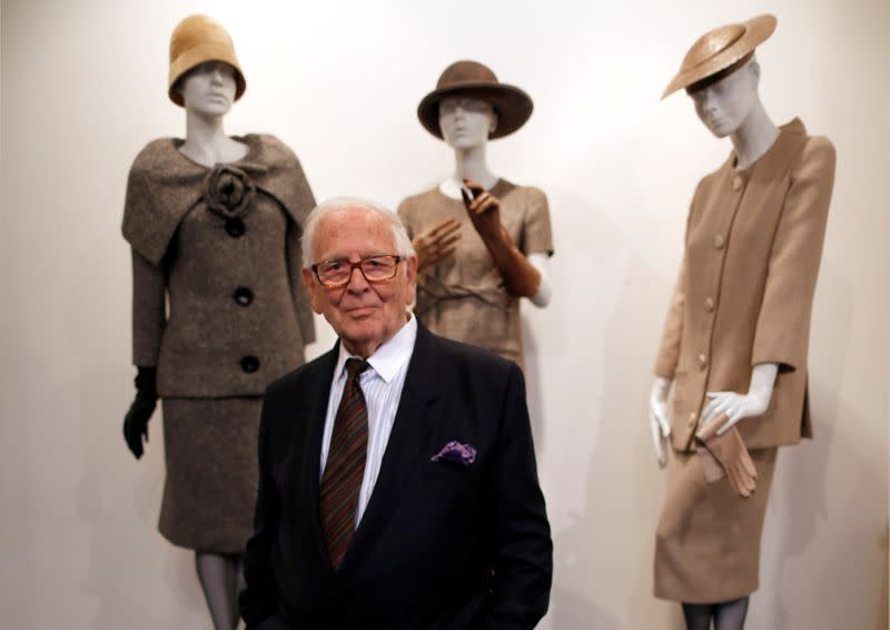 FILE PHOTO: French fashion designer Pierre Cardin poses in front of his fashion creations in his museum called "Past-Present-Future" in Paris