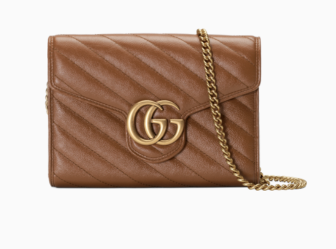 <p><strong>Gucci</strong></p><p>gucci.com</p><p><strong>$1600.00</strong></p><p><a href="https://go.redirectingat.com?id=74968X1596630&url=https%3A%2F%2Fwww.gucci.com%2Fus%2Fen%2Fpr%2Fwomen%2Faccessories-for-women%2Fwallets-and-small-accessories-for-women%2Fchain-wallets-for-women%2Fgg-marmont-matelasse-mini-bag-p-4745750OLFT2535%3Fgclid%3DCjwKCAiAs92MBhAXEiwAXTi25xWEVBtPkjY7lvWtnybe5h9S1diSrjodbiHsXxKjtclrvsx6dbMJkRoCtCUQAvD_BwE&sref=https%3A%2F%2Fwww.townandcountrymag.com%2Fstyle%2Ffashion-trends%2Fg38304908%2Fhow-to-dress-like-lady-gaga-house-of-gucci%2F" rel="nofollow noopener" target="_blank" data-ylk="slk:Shop Now;elm:context_link;itc:0;sec:content-canvas" class="link ">Shop Now</a></p><p>Emblematic of the classic Gucci design, this bag is a must-have.</p>