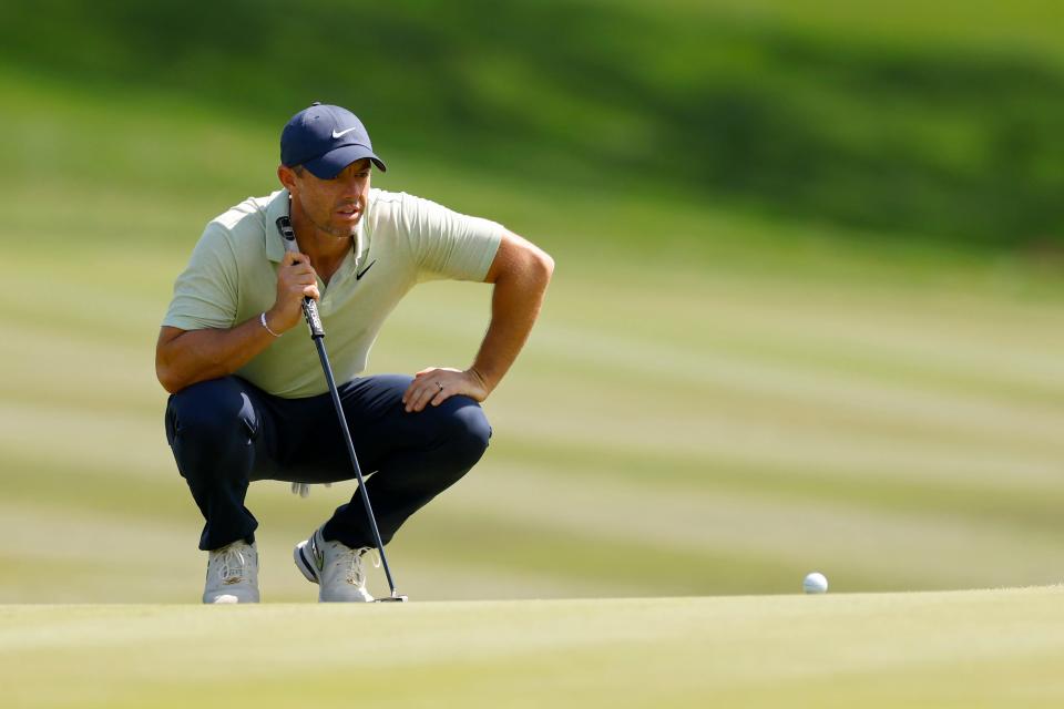 PONTE VEDRA BEACH, FLORIDA - MARCH 17: Rory McIlroy of Northern Ireland lines up a putt on the ninth green during the final round of THE PLAYERS Championship at TPC Sawgrass on March 17, 2024 in Ponte Vedra Beach, Florida. (Photo by Mike Ehrmann/Getty Images)