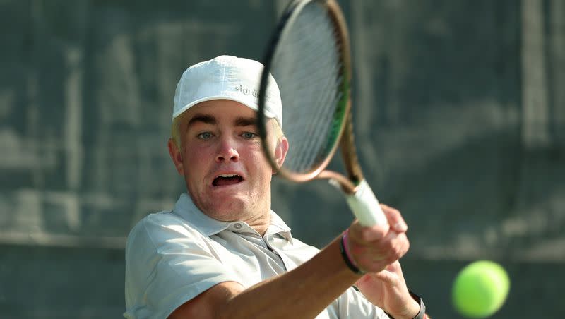 Corner Canyon’s Alex Fuch returns a ball as he and Skyridge’s Calvin Armstrong play in the high school 6A boys state tennis championships at Liberty Park Tennis in Salt Lake City on Saturday, May 20, 2023.