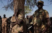 South Sudan soldiers gather at the training site for the joint force to protect VIPs in Gorom outside Juba