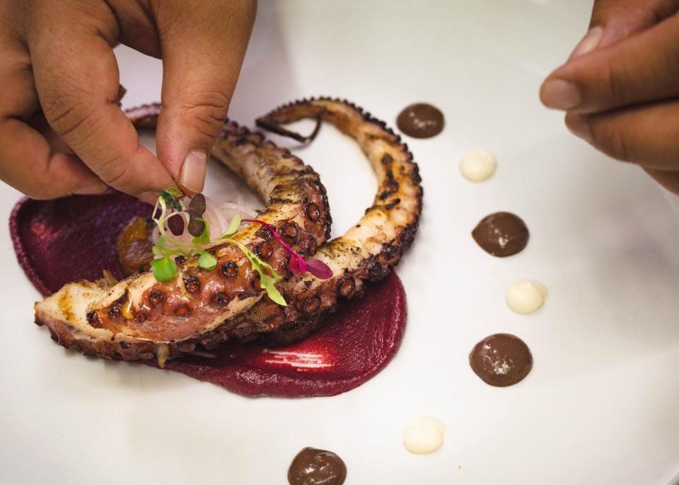 Octopus is prepares at Walnut Street Kitchen.