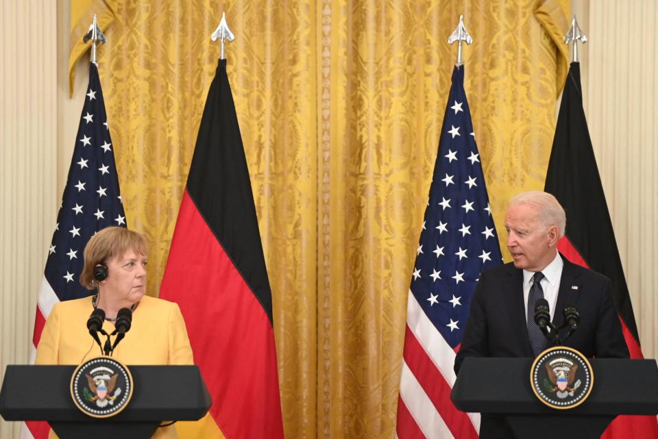 U.S. President Joe Biden and German Chancellor Angela Merkel hold a joint press conference in the East Room of the White House in Washington, D.C., July 15, 2021. / Credit: SAUL LOEB/AFP/Getty