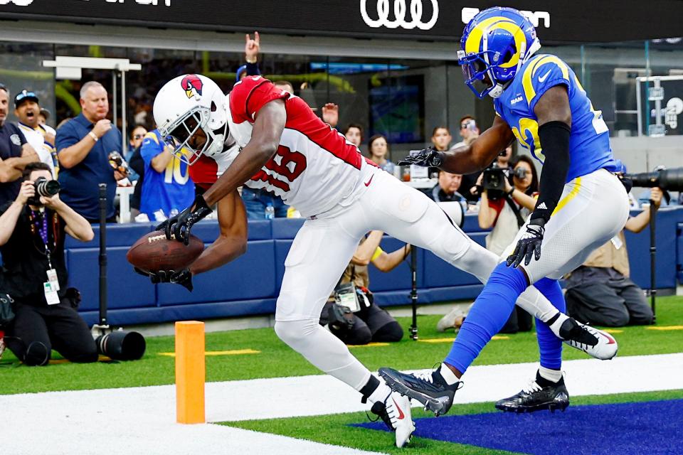 A.J. Green #18 of the Arizona Cardinals scores a touchdown over David Long Jr. #22 of the Los Angeles Rams in the second quarter of the game at SoFi Stadium on November 13, 2022, in Inglewood, California.