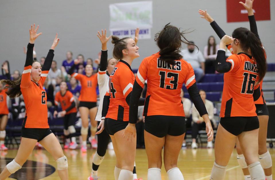Marlington celebrates after a point during a district semifinal against Edgewood, Wednesday, Oct. 25, 2023, in Niles.