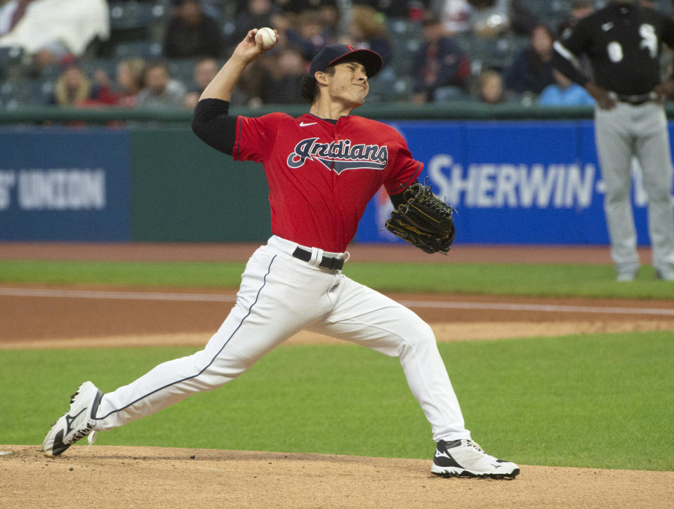 Cleveland Indians starting pitcher Eli Morgan delivers against the Chicago White Sox during the first inning of a baseball game in Cleveland, Saturday, Sept. 25, 2021. (AP Photo/Phil Long)