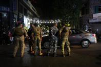 Lebanese soldiers stand guard at a street that leads to the American University hospital where they bring wounded people whose handheld pager exploded, in Beirut, Lebanon, Tuesday, Sept. 17, 2024. (AP Photo/Hassan Ammar)