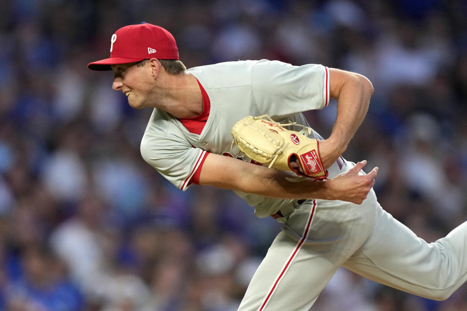 Philadelphia Phillies starting pitcher Michael Mercado follows through during the fourth inning of a baseball game against the Chicago Cubs Tuesday, July 2, 2024, in Chicago. (AP Photo/Charles Rex Arbogast)