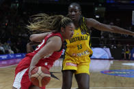 Japan's Monica Okoye runs past Australia's Ezi Magbegor during their game at the women's Basketball World Cup in Sydney, Australia, Tuesday, Sept. 27, 2022. (AP Photo/Mark Baker)