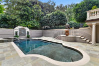 It also features an elegant pool. (Photo credit: Josh Vick, HomeTour America)