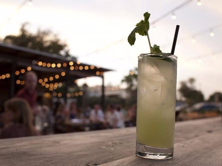 A boutique cocktail called El Pepino with tequila, cucumber, mint and lime is seen at Contigo restaurant in Austin, Texas September 24, 2012. In Austin, flip-flop-wearing University of Texas students mingle with coat-tie-and-boot-clad state lawmakers and technology workers in jeans. REUTERS/Julia Robinson