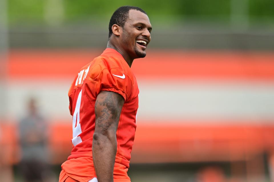 Browns quarterback Deshaun Watson celebrates a touchdown pass during organized team activities in Berea, May 25, 2022.