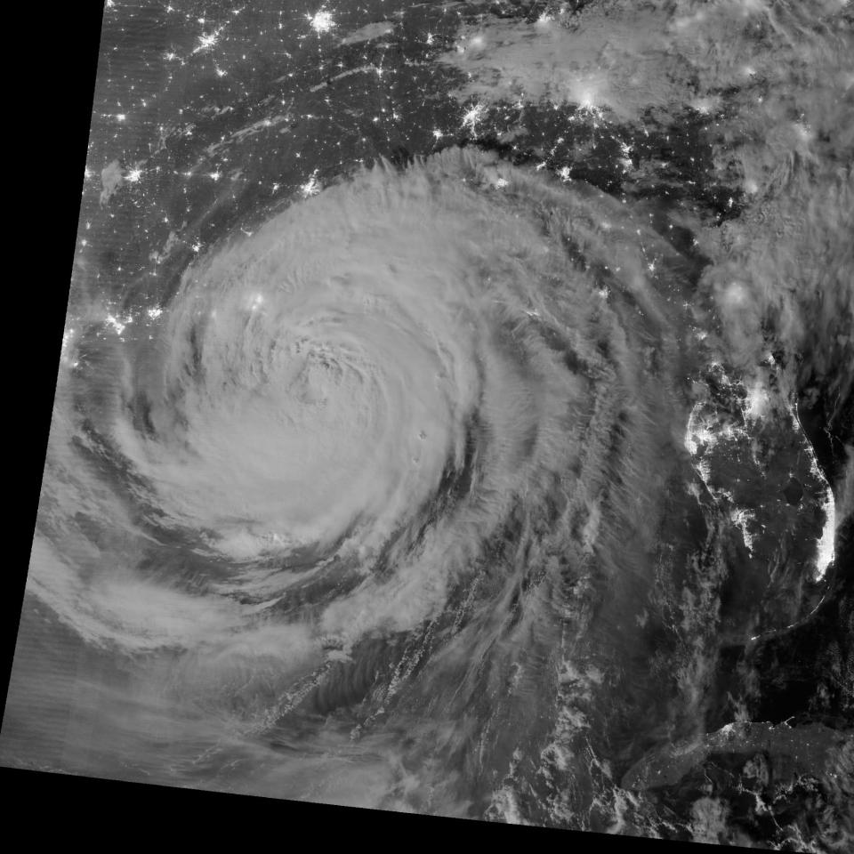 Early on August 29, 2012, the Visible Infrared Imaging Radiometer Suite (VIIRS) on the Suomi-NPP satellite captured this nighttime view of Hurricane Isaac and the cities near the Gulf Coast of the United States. The image was acquired at 1:57 a.m. local time (6:57 Universal Time) by the VIIRS “day-night band,” which detects light in a range of wavelengths from green to near-infrared and uses light intensification to enable the detection of dim signals. In this case, the clouds were lit by moonlight. (NASA)