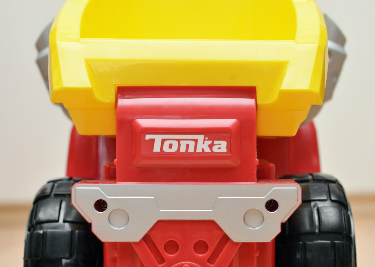 "Vancouver, Canada -- February 18, 2013:Close up of a Tonka brand truck on a wood floor.