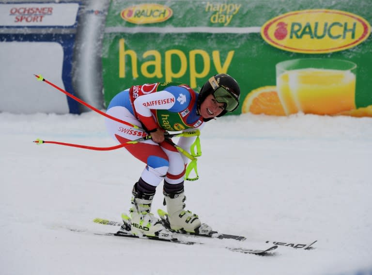 Lara Gut of Switzerland celebrates after winning the Audi FIS Ski World Cup 1st Women's Super-G race at the Lake Louise Ski Resort in Alberta, Canada on December 4, 2016